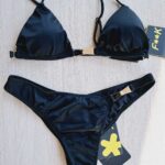 COSTUME DONNA EFFEK ESTATE 2025. TRIANGOLO CON IMBOTTITURA ESTRAIBILE, BRETELLINA E SOTTOSENO REGOLABILE. COMPLETA IL TUTTO UNA BELLISSIMA BRASILIANA. DETTAGLIO IN METALLO IN ENTRAMBI I PEZZI. COLORE NERO