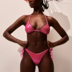 COSTUME DONNA MATINEE DELLA STAGIONE ESTATE 2025. TRIANGOLO E SLIP CON LACCETTI IN TULLE CANGIANTE COLOR FUCSIA