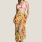 PAREO LUNGO DONNA 4GIVENESS DELLA STAGIONE ESTATE 2025. FANTASIA ROSA E FUCSIA CON FIORI E PALME