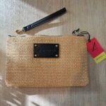 POCHETTE MARE 4GIVENESS IN RAFIA DELLA STAGIONE ESTATE 2025 CON TASSELLO NERO