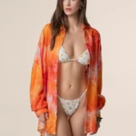 CAMICIONE ME FUI DONNA DELLA STAGIONE ESTATE 2025. 100% VISCOSA A MANICHE LUNGHE NEI COLORI DELL'ARANCIO E DEL ROSA