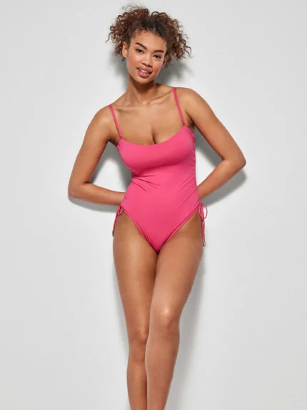 COSTUME DONNA INTERO GISELA FUCSIA A FASCIA CON BRETELLINA REMOVIBILE E LACCETTI LATERALI PER POTER SGAMBARE IL COSTUME