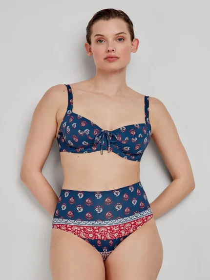 COSTUME DONNA A DUE PEZZI GISELA CON COPPA VUOTA, FERRETTO E BRETELLINA REGOLABILE. SLIP A VITA ALTA. FANTASIA ROSSA E BLU