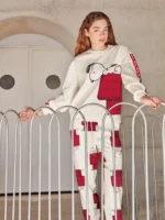 PIGIAMA/TUTA DONNA GISELA IN PILE BIANCO E ROSSO CON STAMPA SNOOPY - immagine 5