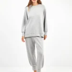 TUTA DONNA GISELA GRIGIO CHIARO MAGLIA A GIROCOLLO CON ZIP LATERALI E PANTALONE DRITTO CON POLSINO