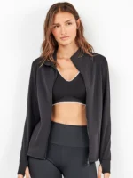 MAGLIA DONNA GISELA IN TESSUTO TECNICO NEL COLORE NERO CON ZIP E FORI PER IL POLLICE