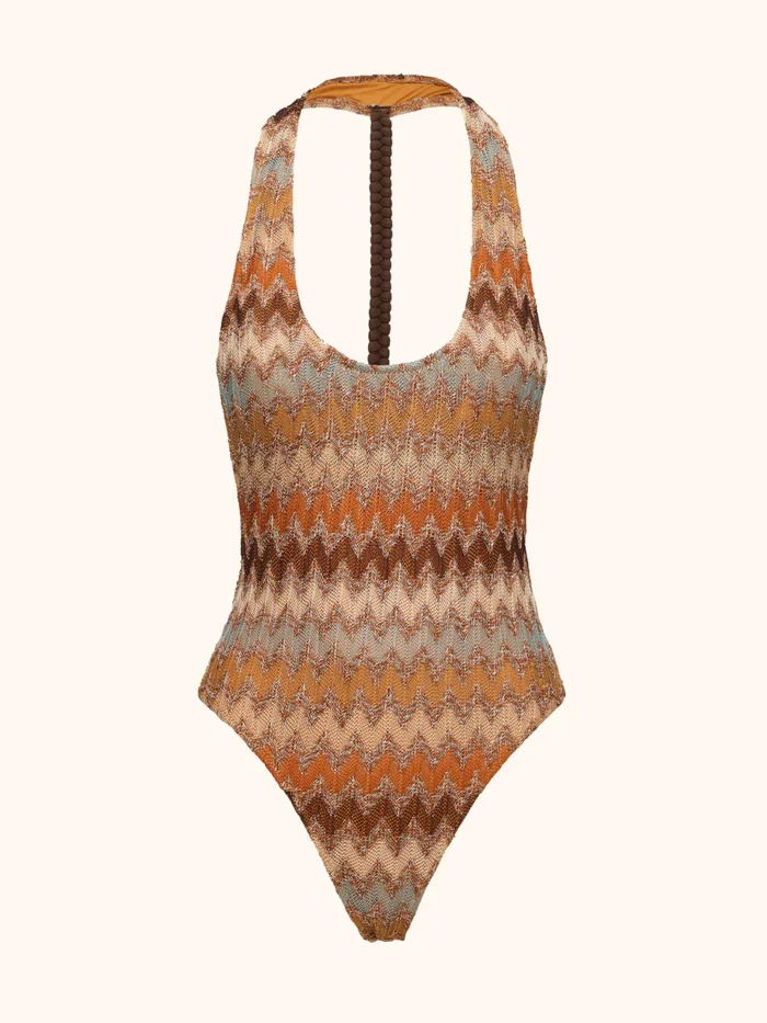 COSTUME DONNA ME FUI INTERO NEI COLORI CALDI DELLA TERRA. TRECCIA SULLA SCHIENA - immagine 3