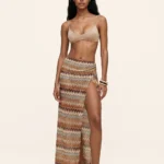 PAREO LUNGO/GONNA ME FUI DELLA COLLEZIONE ESTATE 2026 TESSUTO TRAFORATO NEI CALDI COLORI DELLA TERRA