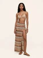 PAREO LUNGO/GONNA ME FUI DELLA COLLEZIONE ESTATE 2026 TESSUTO TRAFORATO NEI CALDI COLORI DELLA TERRA