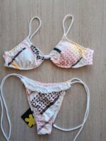 COSTUME DONNA EFFEK A DUE PEZZI DELLA STAGIONE ESTATE 2026. FASCIA/TOP IMBOTTITURA ESTRAIBILE CON BRETELLINA REGOLABILE IN TESSUTO SANGALLO BIANCOE E FANTASIA. PIZZETTO BIANCO