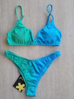 COSTUME DONNA EFFEK A DUE PEZZI DELLA STAGIONE ESTATE 2025. TOP CON IMBOTTITURA ESTRAIBILE, CHIUSURA CON GANCIO E BRETELLINA REGOLABILE. COLORE SFUMATO AZZURRO E VERDE ACQUA