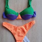 COSTUME DONNA ME FUI A DUE PEZZI DELLA STAGIONE ESTATE 2026. BALCONCINO CON FERRETTO, IMBOTTITURA ESTRAIBILE. CHIUSURA CON GANCIO E BRETELLINA REGOLABILE. TESSUTO A COSTINE NEI COLORI VERDE ACQUA, ARANCIO E LILLA