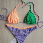 COSTUME DONNA ME FUI A DUE PEZZI DELLA STAGIONE ESTATE 2026. TRIANGOLO CON IMBOTTITURA ESTRAIBILE, TESSUTO A COSTINE NEI COLORI DELL'ARANCIO, LILLA E VERDE