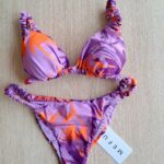 COSTUME DONNA ME FUI A DUE PEZZI DELLA STAGIONE ESTATE 2026. TRIANGOLO CON IMBOTTITURA EDTRAIBILE E CLASSICA BRETELLINA ARRICCIATA. LILLA CON FANTASIA VIOLA E ARANCIO