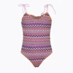 COSTUME EFFEK BIMBA INTERO DELLA COLLEZIONE ESTATE 2026. NEL CLASSICO MODELLO ARRICCIATO, TESSUTO TRAFORATO CON BASE LILLA