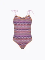 COSTUME EFFEK BIMBA INTERO DELLA COLLEZIONE ESTATE 2026. NEL CLASSICO MODELLO ARRICCIATO, TESSUTO TRAFORATO CON BASE LILLA