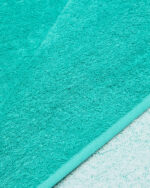 TELO MARE EMPORIO ARMANI IN SPUGNA LEGGERA LOGATO VERDE ACQUA - immagine 2
