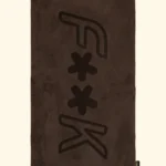 TELO MARE EFFEK IN SPUGNA LEGGERA DELLA COLLEZIONE ESTATE 2026 IN TINTA UNITA COLOR MARRONE