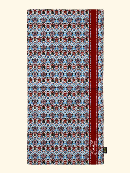 TELO MARE EFFEK IN MICROFIBRA DELLA COLLEZIONE ESTATE 2026. FANTASIA TURCHESE E COCCIO SU BASE PANNA