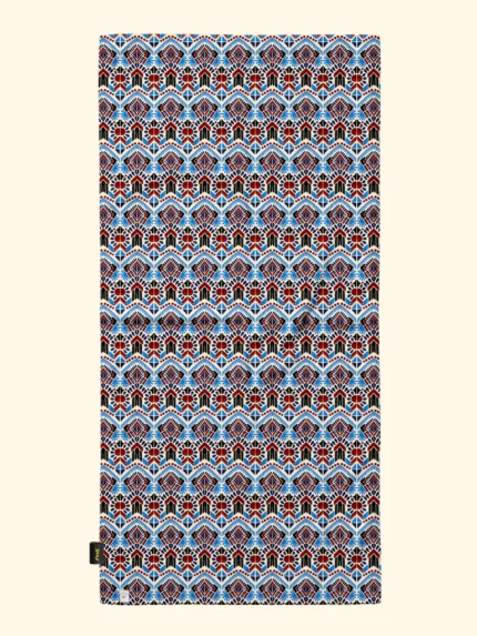 TELO MARE EFFEK IN MICROFIBRA DELLA COLLEZIONE ESTATE 2026. FANTASIA TURCHESE E COCCIO SU BASE PANNA