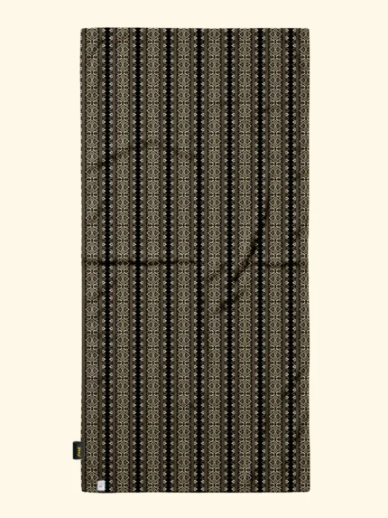 TELO MARE EFFEK IN MICROFIBRA DELLA COLLEZIONE ESTATE 2026. FANTASIA TRIBALE PANNA SU BASE NERA