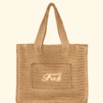BORSA MARE EFFEK IN RAFIA DELLA COLLEZIONE ESTATE 2026. FODERATA CON LOGO RICAMATO NEL COLOR BEIGE NATURALE