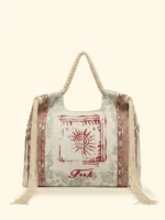 BORSA MARE EFFEK IN TELA DELLA STAGIONE ESTATE 2026. MANICI IN CORDA CON FRANGE LATERALI. BASE PANNA CON FANTASIA VERDE SALVIA E BRUCIATO