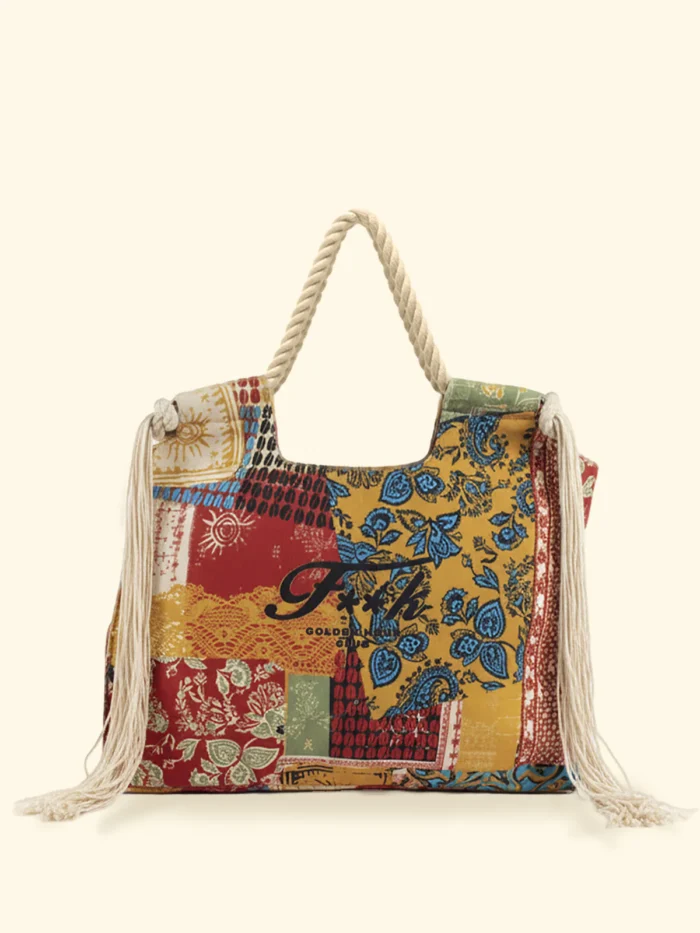 BORSA MARE EFFEK IN TELA DELLA STAGIONE ESTATE 2026. MANICI IN CORDA CON FRANGE LATERALI. BASE PANNA CON FANTASIA TURCHESE, SENAPE E COCCIO