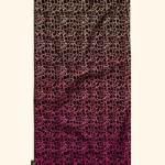 TELO MARE EFFEK IN MICROFIBRA DELLA COLLEZIONE ESTATE 2026. FANTASIA LEOPARDATA CON UNA PARTE SFUMATA DI FUCSIA