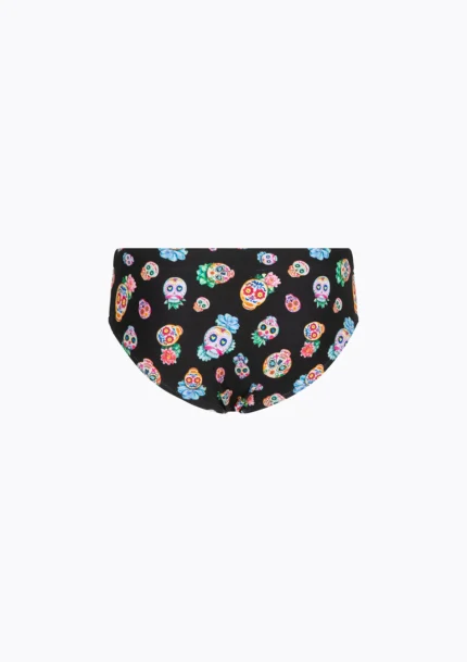 COSTUME BIMBO EFFEK DELLA STAGIONE ESTATE 2026. SLIP BASE NERA CON STAMPA DI TESCHI COLORATI