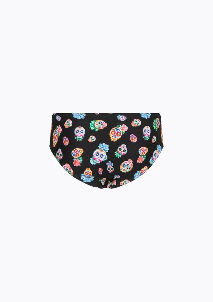 COSTUME BIMBO EFFEK DELLA STAGIONE ESTATE 2026. SLIP BASE NERA CON STAMPA DI TESCHI COLORATI