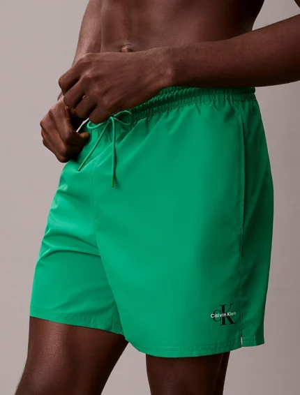 COSTUME UOMO CALVIN KLEIN A PANTALONCINO DELLA STAGIONE ESTATE 2026. MEDIO COLOR VERDE ACCESO CON LOGHINO