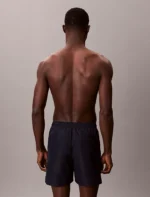 COSTUME UOMO CALVIN KLEIN PANTALONCINO MEDIO BLU CON SCRITTA LATERALE BIANCA - immagine 5