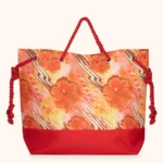BORSA MARE ME FUI DELLA COLLEZIONE ESTATE 2026. TESSUTO CANVA CON MANICI IN CORDA FANTASIA ARANCIO