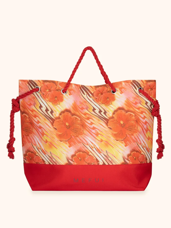 BORSA MARE ME FUI DELLA COLLEZIONE ESTATE 2026. TESSUTO CANVA CON MANICI IN CORDA FANTASIA ARANCIO