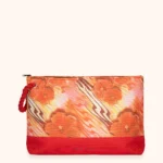 MAXI POCHETTE ME FUI DELLA COLLEZIONE ESTATE 2026. TESSUTO CANVA CON MANICI IN CORDA FANTASIA ARANCIO