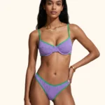 COSTUME DONNA ME FUI A DUE PEZZI DELLA STAGIONE ESTATE 2026. BALCONCINO CON FERRETTO NEL TESSUTO A COSTINE LILLA CON PROFILI VERDI