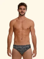 COSTUME UOMO EFFEK DELLA STAGIONE ESTATE 2026. SLIP A FANTASIA TRIBALE BEIGE SU BASE NERA