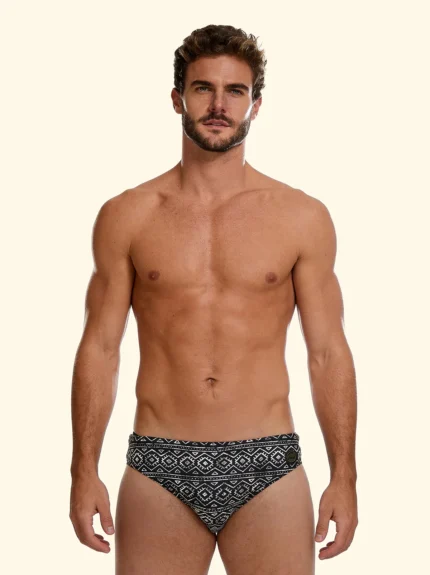 COSTUME UOMO EFFEK DELLA STAGIONE ESTATE 2026. SLIP A FANTASIA TRIBALE BEIGE SU BASE NERA