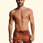 COSTUME UOMO EFFEK A PANTALONCINO DELLA COLLEZIONE ESTATE 2026. FANTASIA EGIZIA NEI COLORI DELL'ARANCIO E COCCIO