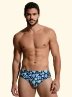 COSTUME UOMO EFFEK DELLA STAGIONE ESTATE 2026. SLIP A FANTASIA CONCHIGLIE E STELLE MARINE CON BASE BLU