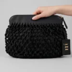 POCHETTE DONNA MATINEE DELLA COLLEZIONE ESTATE 2026. IN RETE FODERATA NEL COLORE NERO