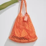 BORSA MARE MATINEE A RETE DELLA COLLEZIONE ESTATE 2026. CON FODERA INTERNA NEL COLORE ARANCIO