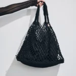 BORSA MARE MATINEE A RETE DELLA COLLEZIONE ESTATE 2026. CON FODERA INTERNA NEL COLORE NERO