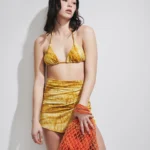 BORSINA MARE MATINEE A RETE DELLA COLLEZIONE ESTATE 2026. CON FODERA INTERNA NEL COLORE ARANCIO
