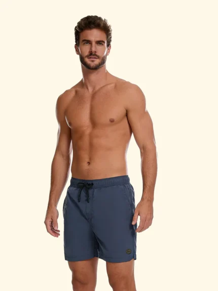 COSTUME UOMO EFFEK DELLA STAGIONE ESTATE 2026. PANTALONCINO A TINTA UNITA LUCIDA NEL COLORE BLU