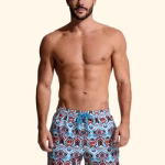 COSTUME UOMO EFFEK DELLA STAGIONE ESTATE 2026. PANTALONCINO FANTASIA DAI COLORI TURCHESE, PANNA NERO E COCCIO