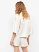 PIGIAMA DONNA GISELA TSHIRT APERTA E SHORT NEL COLOR PANNA CON LEGGERA FANTASIA SATINATA TONO SU TONO - immagine 2
