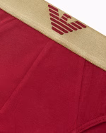 SLIP UOMO EMPORIO ARMANI IN COTONE ROSSO SCURO CON BANDA DORATA E LOGO CENTRALE - immagine 2